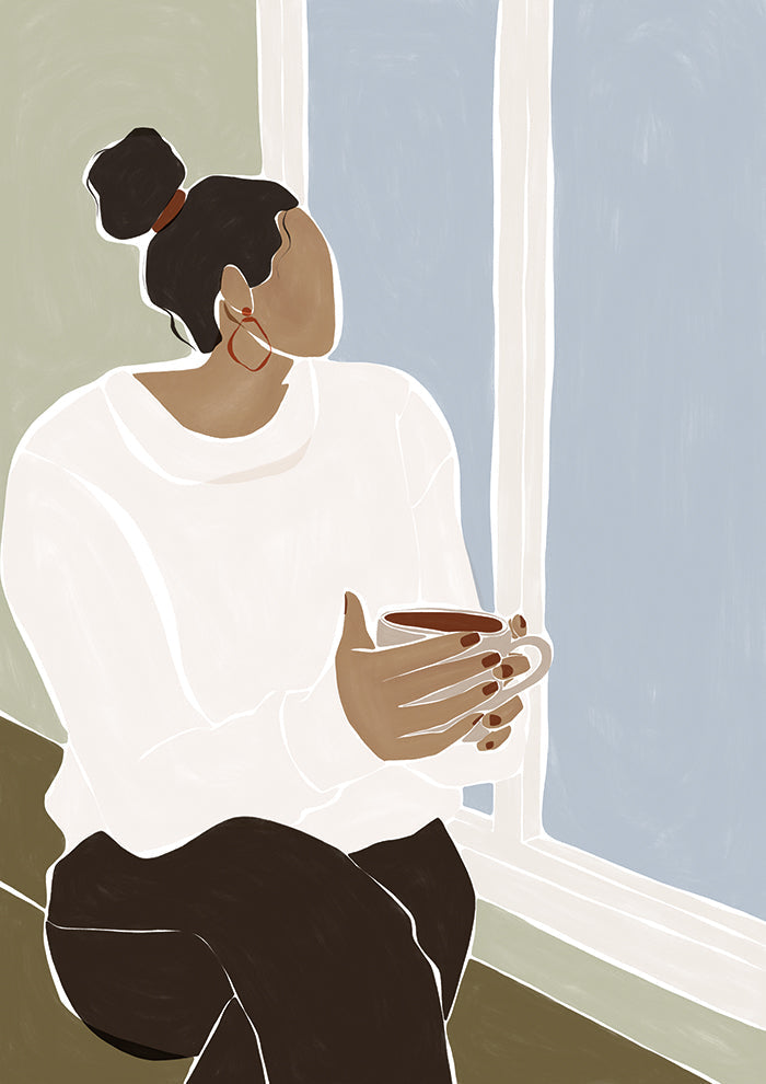 Woman Enjoying a Cup of Tea