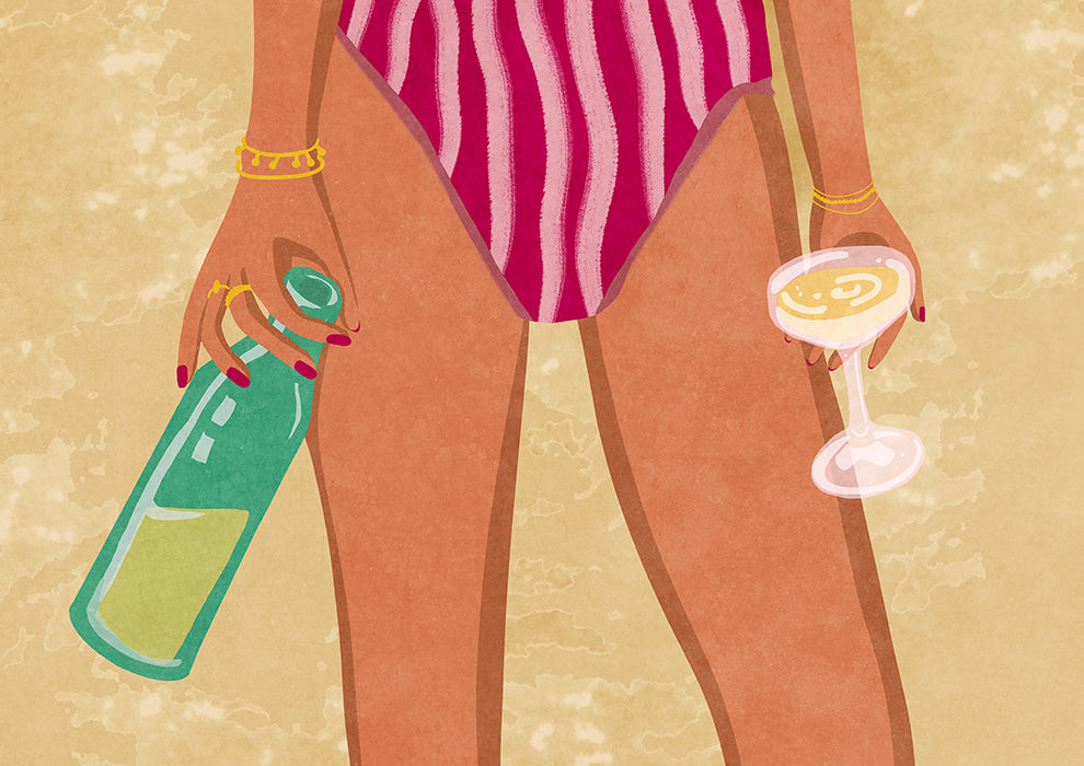 Girl with wine at the beach